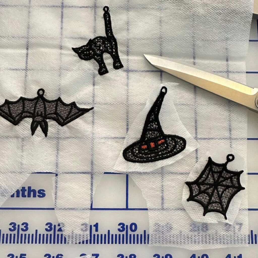 Cut out sewn Halloween charms.
