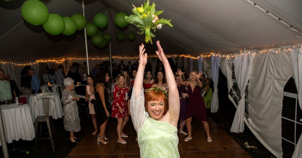 Meg at her wedding in her lime green wedding dress