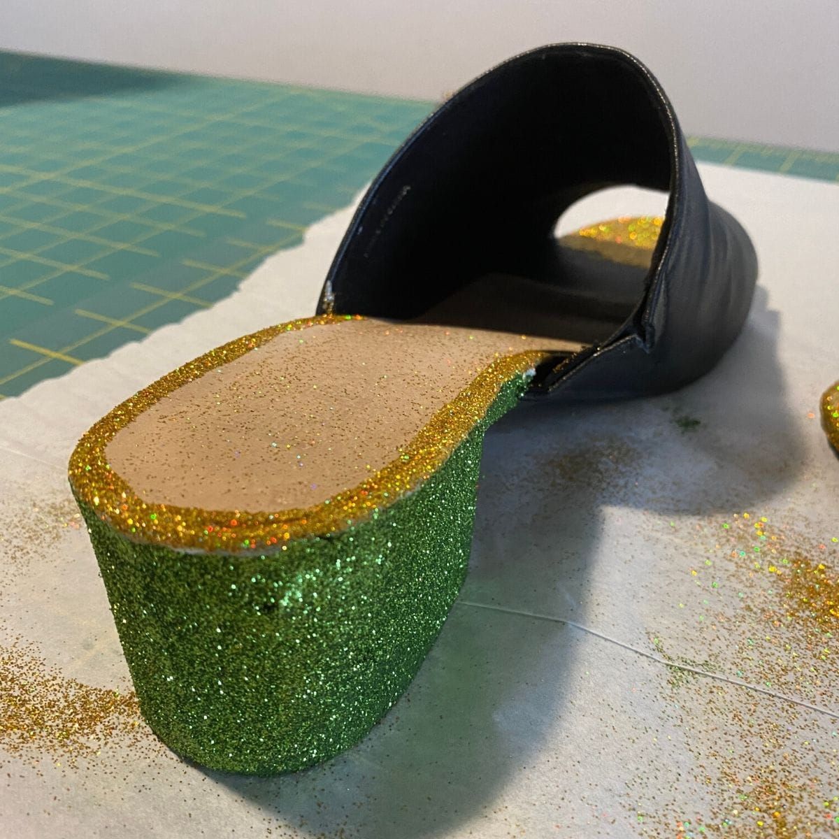 Repairing damaged shoes with mod podge and glitter, step 3