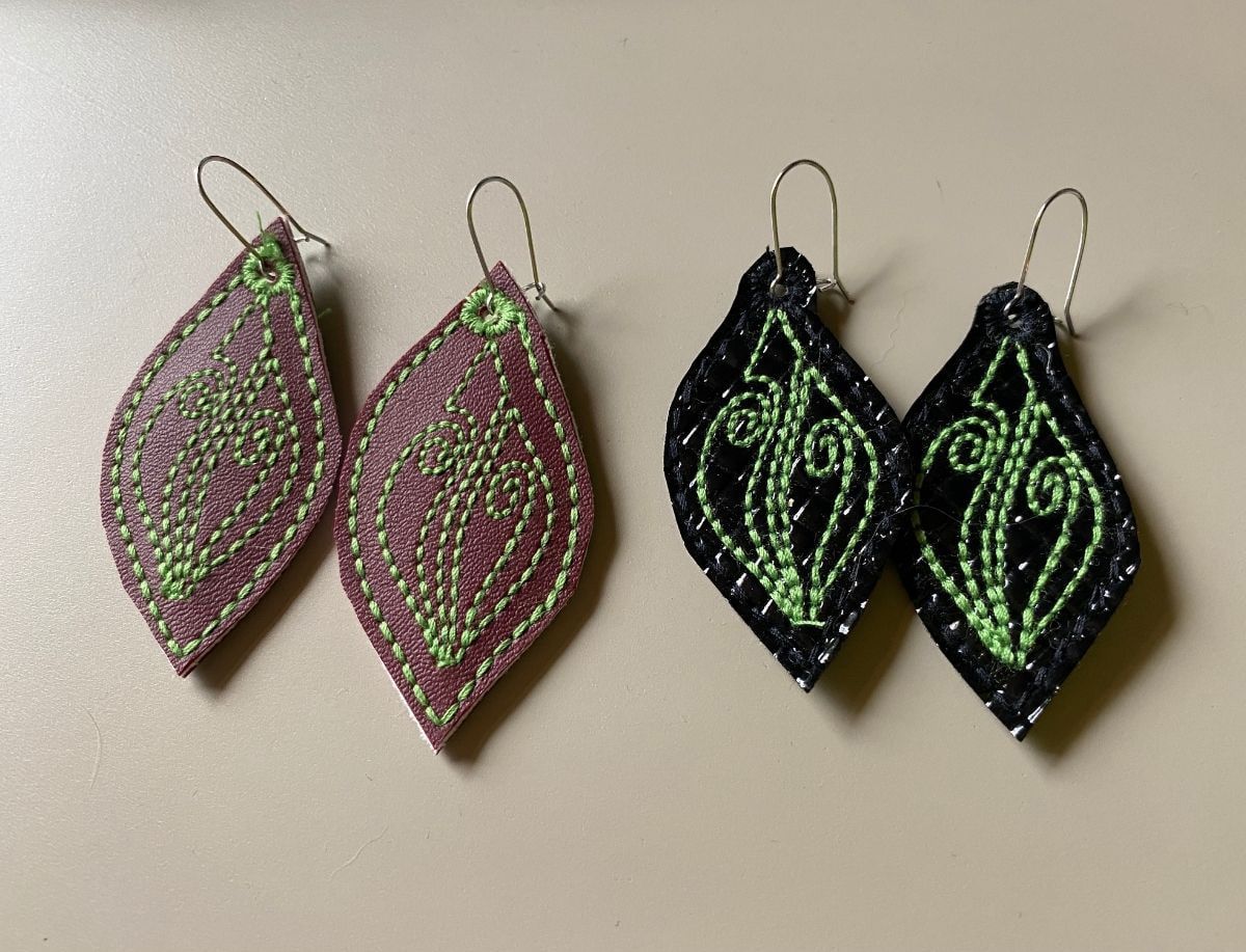 Two pairs of embroidered scrap earrings